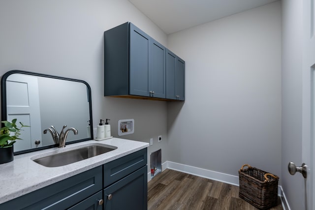 laundry room featuring sink, cabinets, electric dryer hookup, dark hardwood / wood-style floors, and hookup for a washing machine