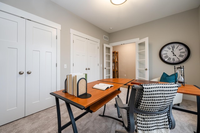 office featuring french doors and carpet floors