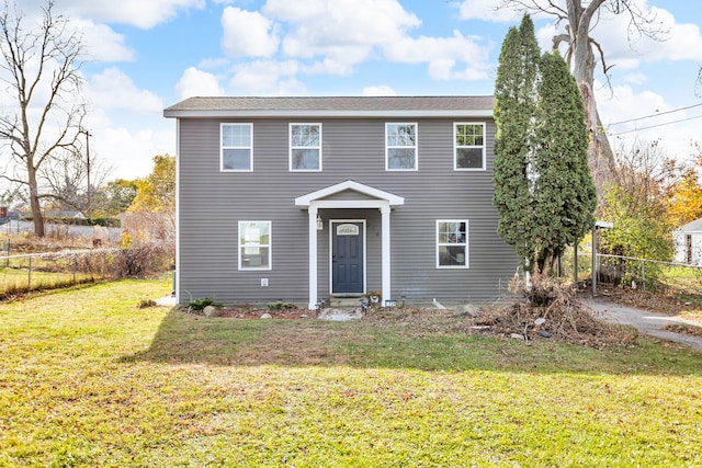 view of front of home featuring a front yard