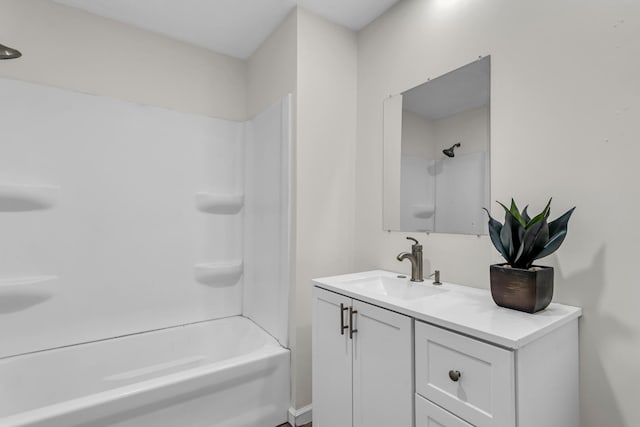 bathroom featuring vanity and bathtub / shower combination