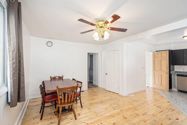 dining room featuring hardwood / wood-style flooring and ceiling fan