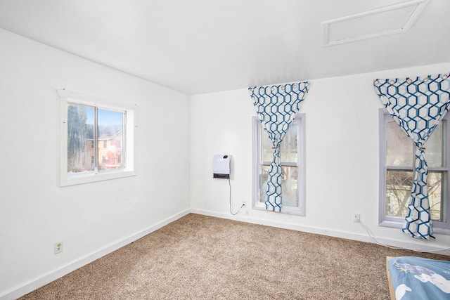 empty room featuring carpet flooring