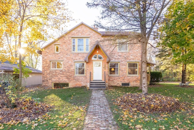 view of front of home featuring a front lawn