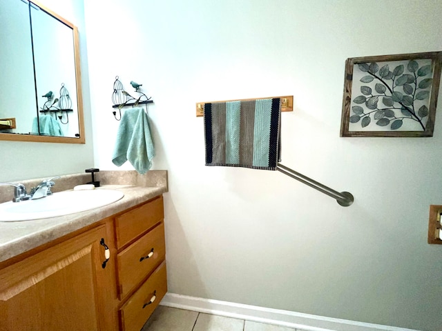 bathroom with tile patterned floors and vanity