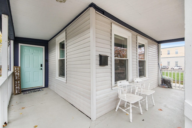 property entrance featuring covered porch