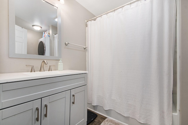 bathroom with vanity, shower / bath combination with curtain, and wood-type flooring