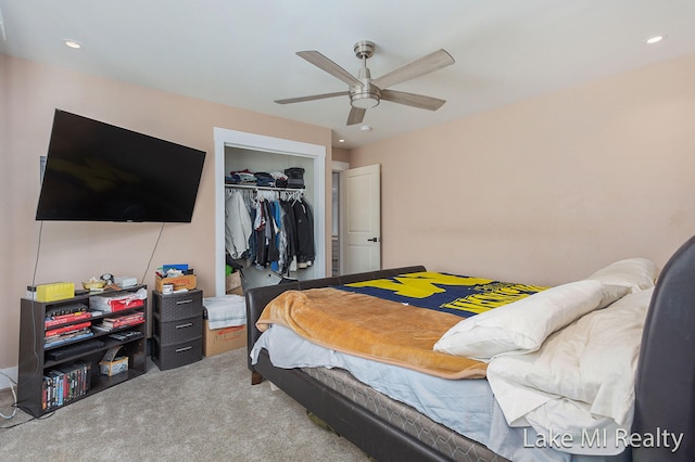 bedroom featuring carpet flooring, ceiling fan, and a closet