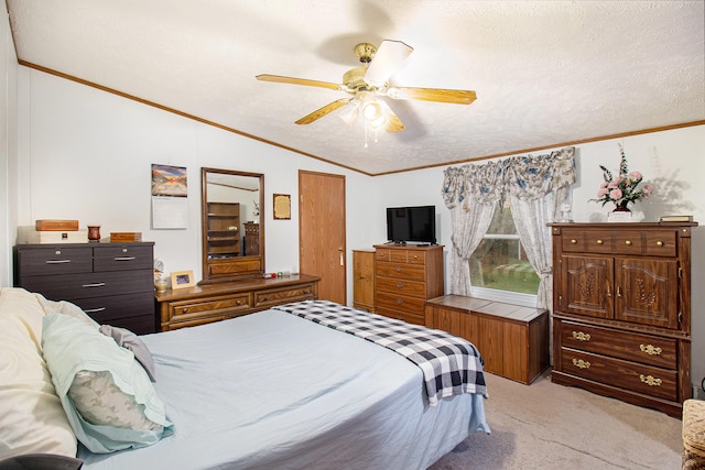 bedroom with light carpet, a textured ceiling, ceiling fan, crown molding, and lofted ceiling