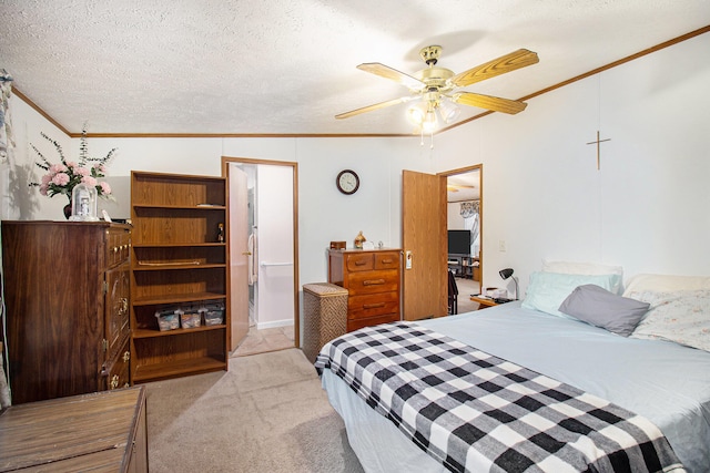 bedroom featuring ceiling fan, crown molding, light colored carpet, lofted ceiling, and a textured ceiling