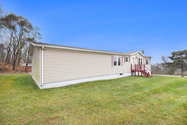 rear view of house with a lawn