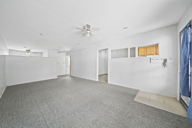 unfurnished room with carpet floors and ceiling fan