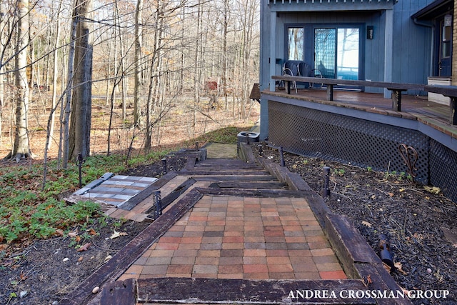 view of patio / terrace featuring a wooden deck