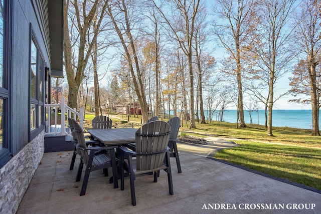 view of patio featuring a water view