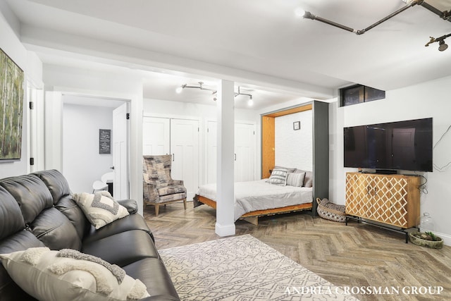 bedroom with parquet flooring