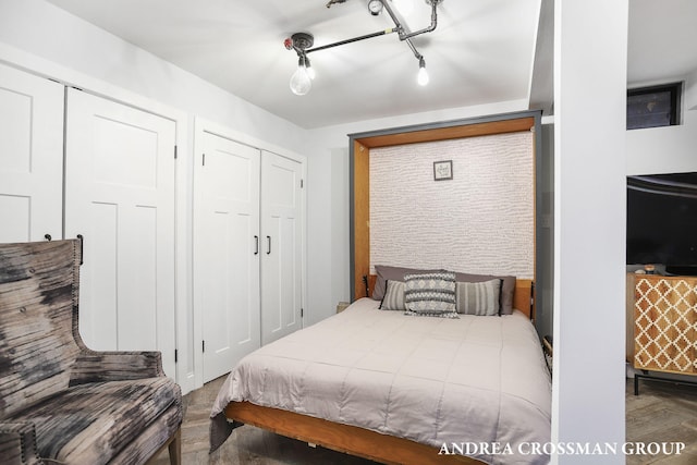 bedroom with wood-type flooring