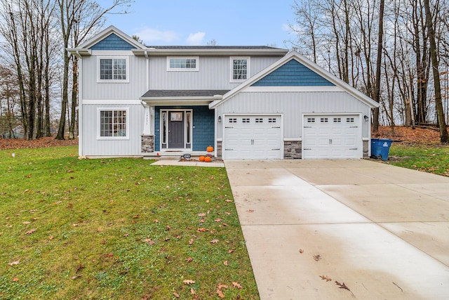 craftsman house with a garage and a front lawn