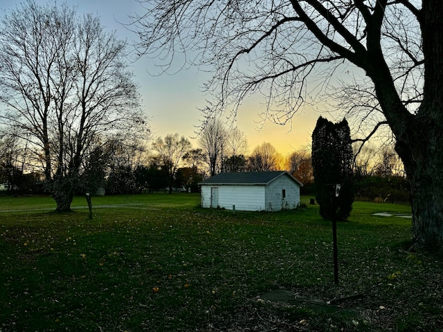 yard at dusk with an outdoor structure