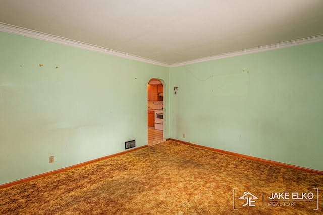 carpeted empty room with crown molding