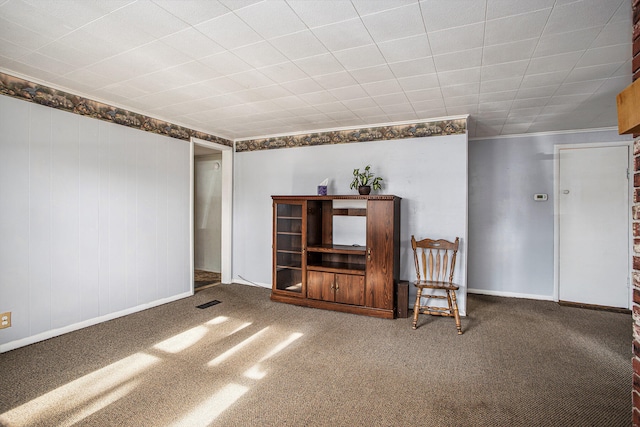 unfurnished living room with carpet floors