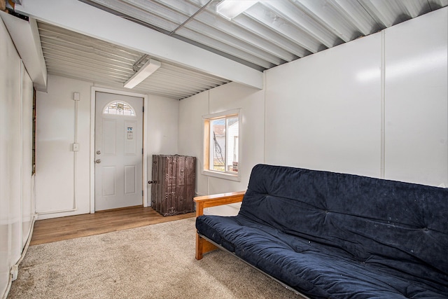 living area with hardwood / wood-style flooring