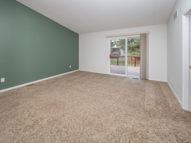 view of carpeted spare room