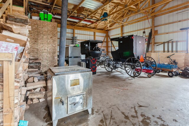 garage with stainless steel fridge