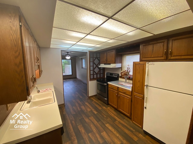 kitchen with ceiling fan, sink, white refrigerator, electric range, and dark hardwood / wood-style floors