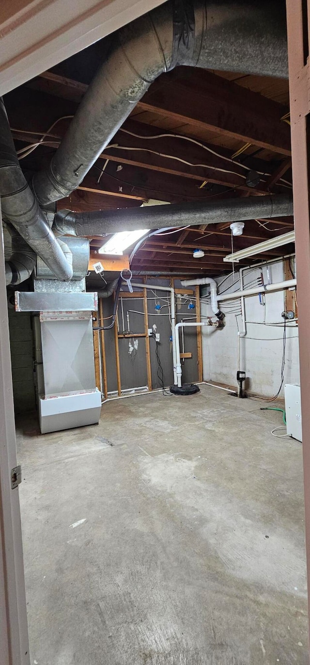 basement with heating unit