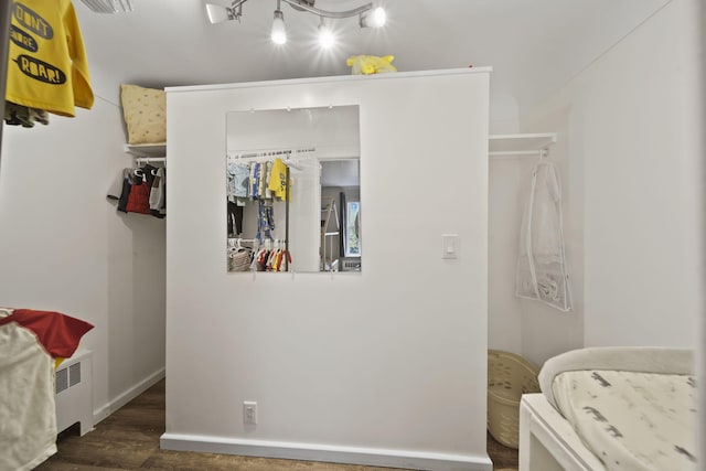 bedroom featuring dark wood-type flooring