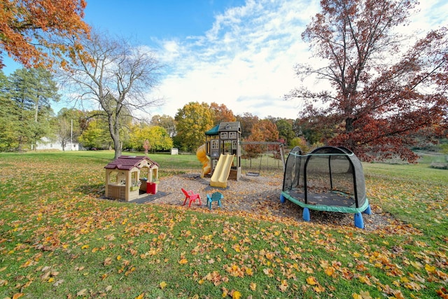 view of play area featuring a yard and a trampoline