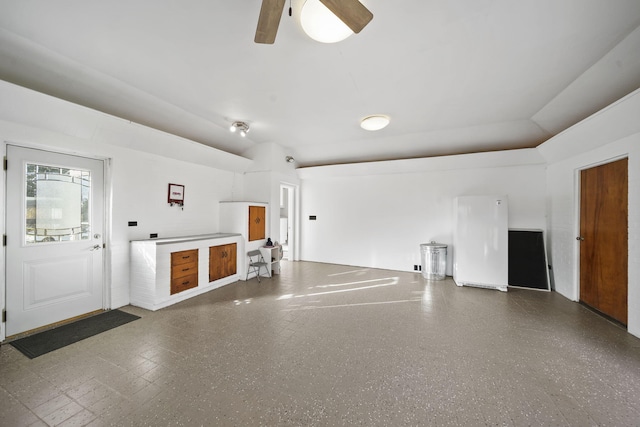 garage with ceiling fan