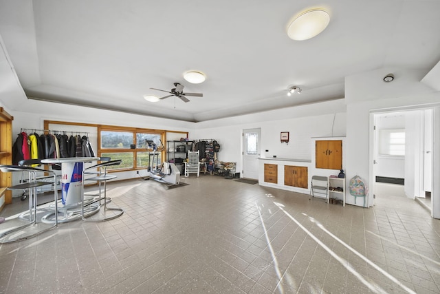 gym featuring ceiling fan