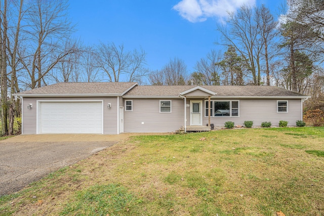 single story home with a front lawn and a garage