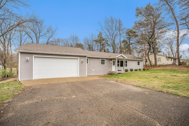 single story home with a front lawn and a garage