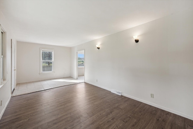 empty room with light hardwood / wood-style floors