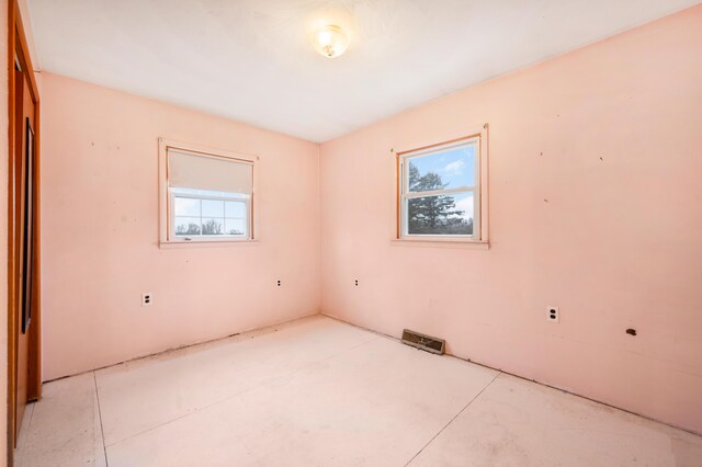 empty room featuring a wealth of natural light