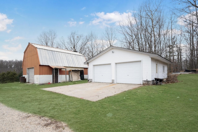 garage with a yard