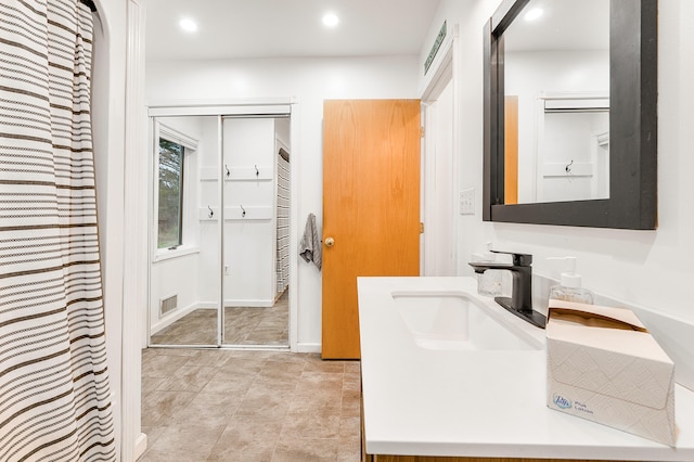 bathroom featuring vanity