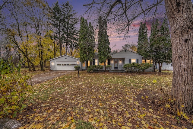 single story home with a garage