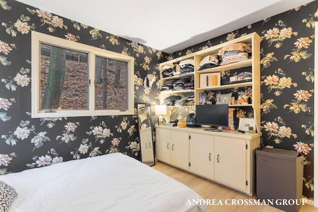 bedroom with light hardwood / wood-style flooring