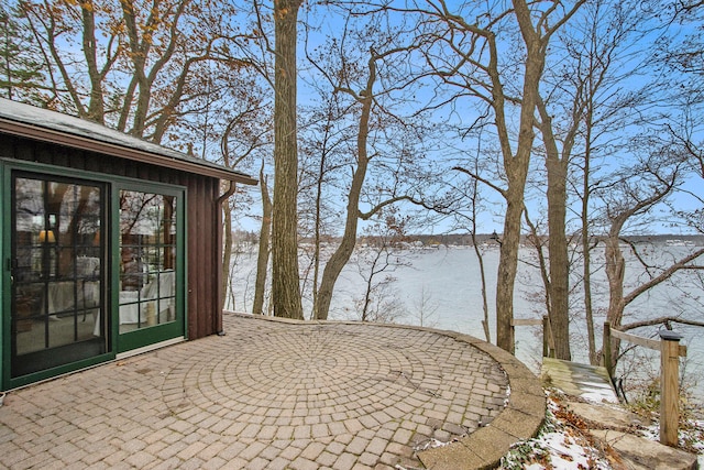 view of snow covered patio