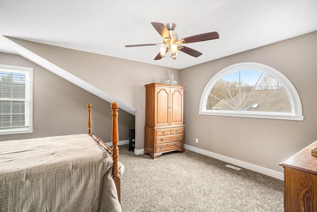 18481 N Fruitport Rd, Spring Lake, MI 49456 - bedroom with light colored carpet, baseboards, and a ceiling fan