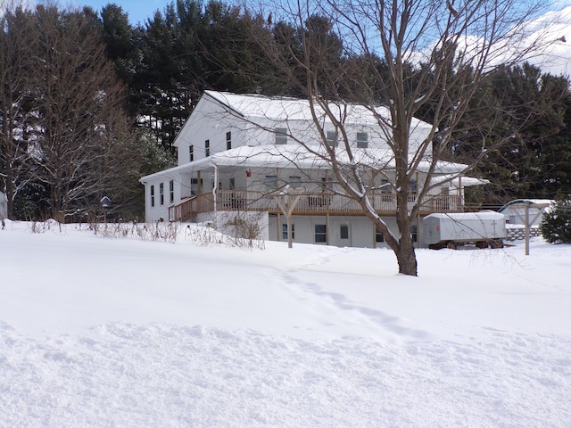 view of snow covered property