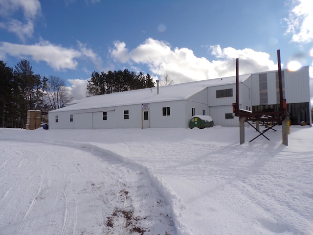 view of snow covered house