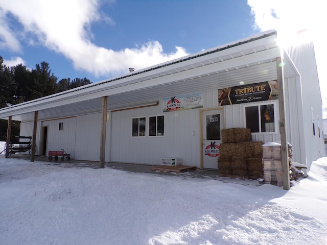 view of snow covered property