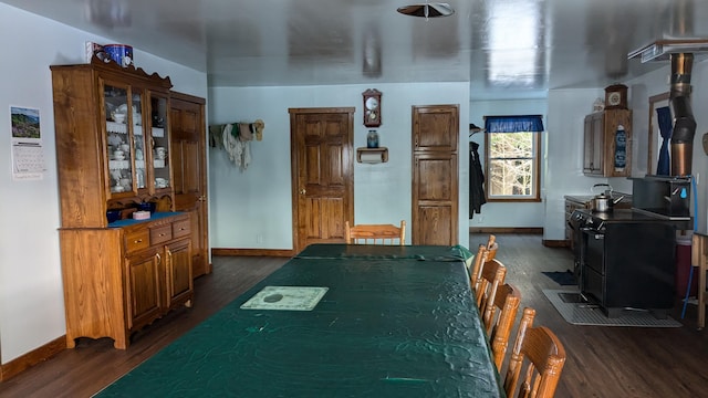 dining room featuring dark hardwood / wood-style flooring