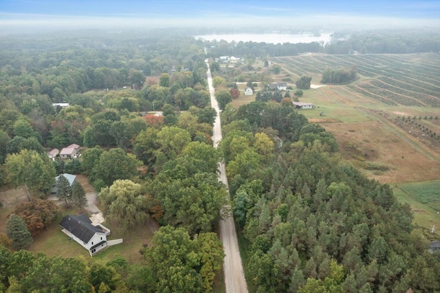 birds eye view of property featuring a rural view