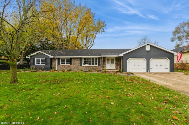 single story home with a front lawn and a garage