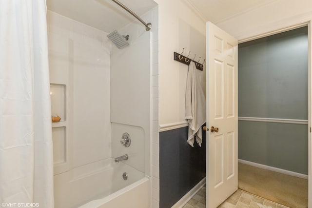 bathroom featuring shower / bathtub combination with curtain