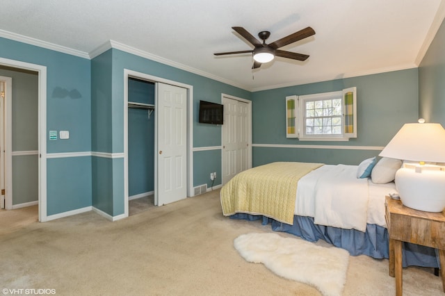 bedroom with ceiling fan, crown molding, and light carpet